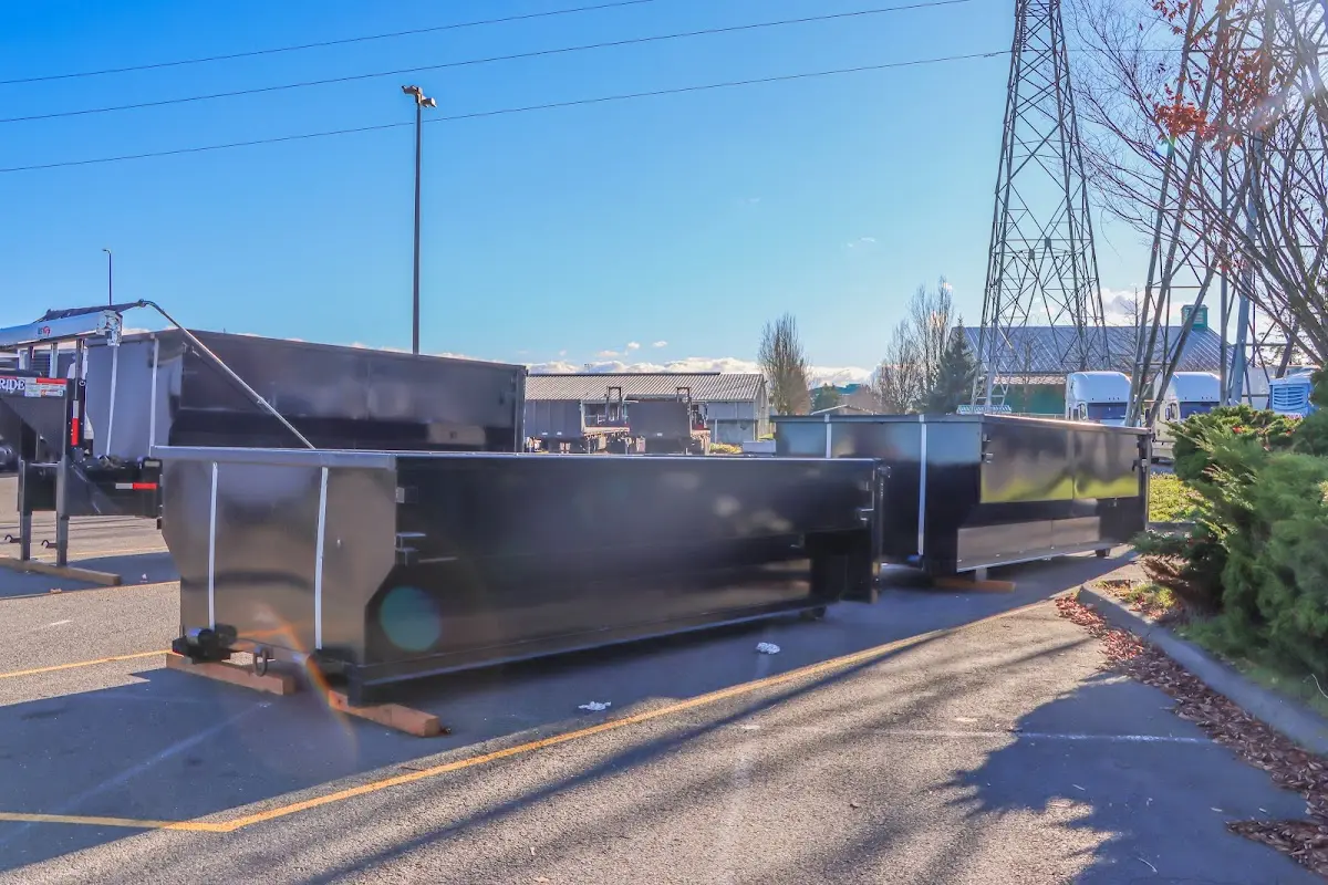 Roll-off dumpster ready for waste disposal at job site for Concrete Dumpster Rental in Conemaugh